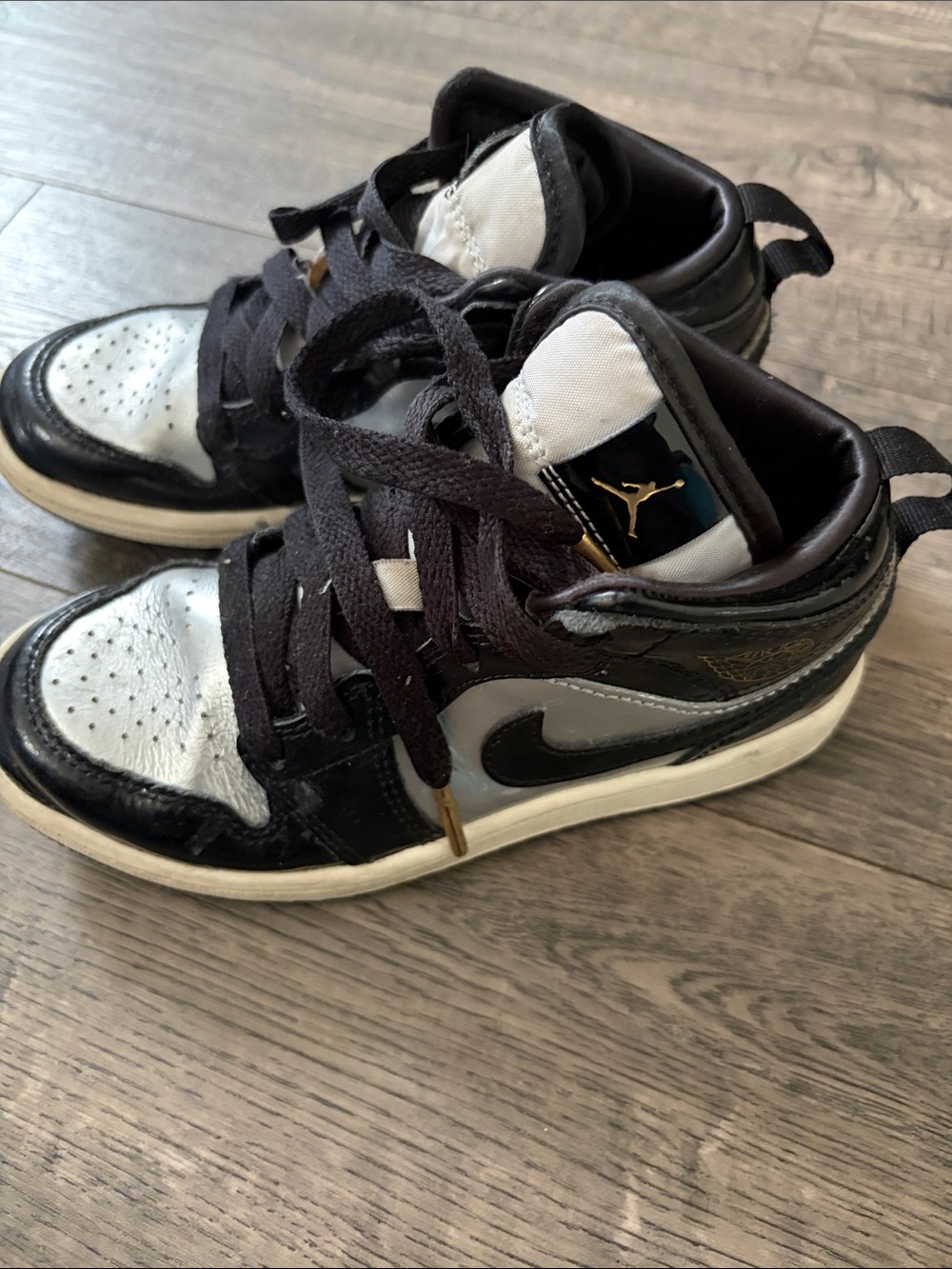 Jordan Kids Black and White High-Top Sneakers with Gold Jumpman